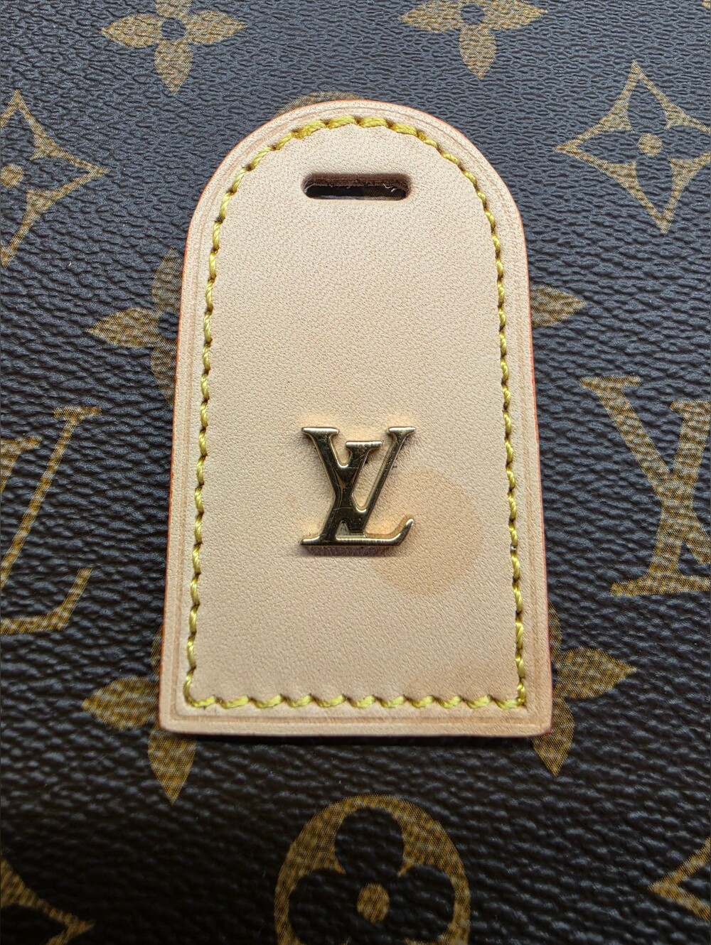 Louis Vuitton Beige Leather Name Tag with Gold LV Logo